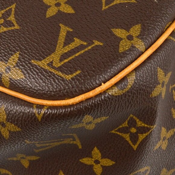 Louis Vuitton Monogram Evasion Travel Bag - Picture 9 of 10